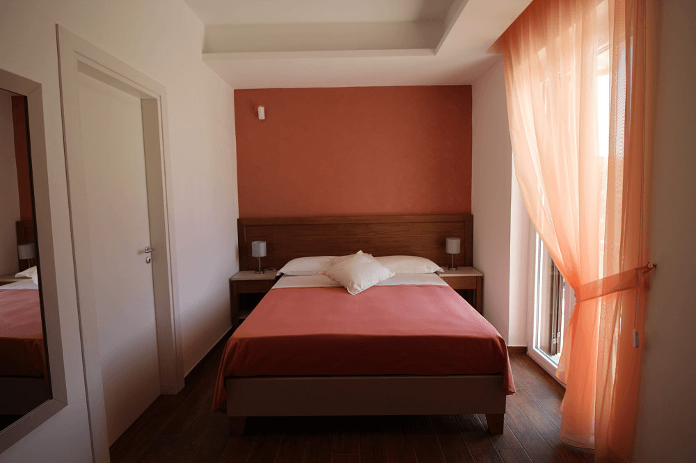 camera-matrimoniale-standard-letto-2.png
